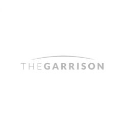 The Garrison logo in greyscale