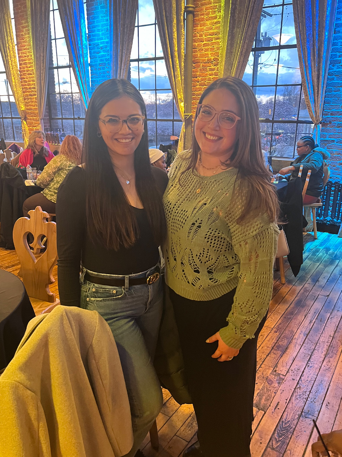 Silvia and Kayla smiling at the camera