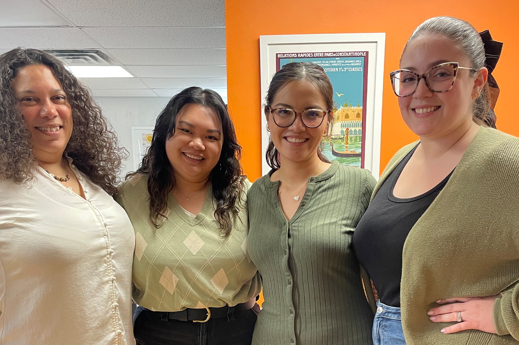 Robbie, Amanda, Silvia, and Kayla in the office