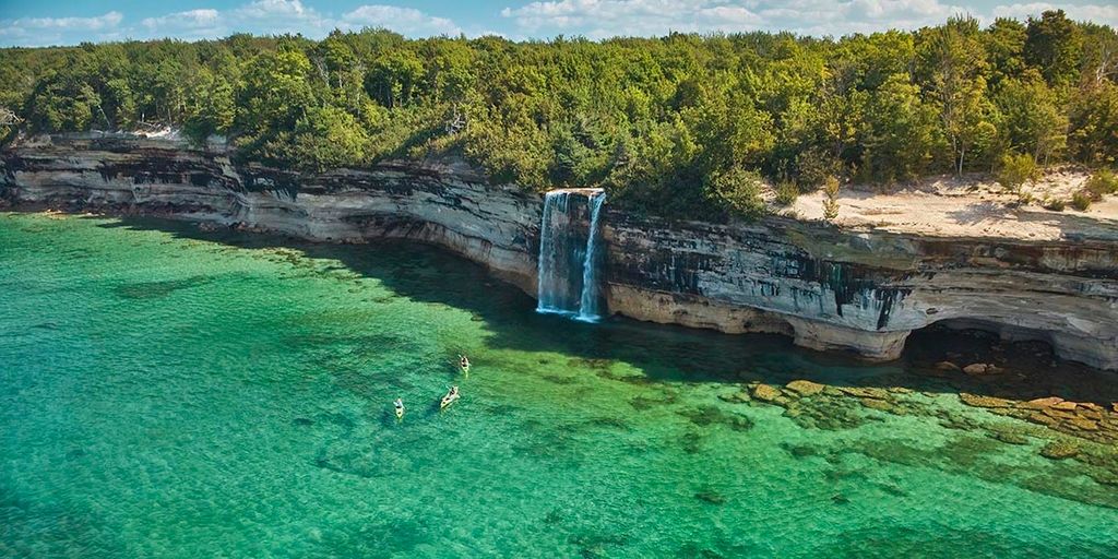 People kayak on Lake Superior in Michigan’s Upper Peninsula.